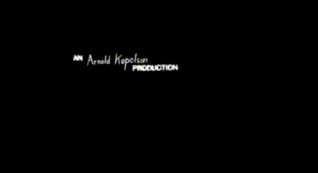 00:06 - 'An Arnold Kopelson Production'