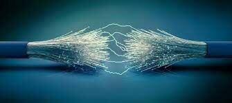 Creación de Fibra óptica y la computadora portátil