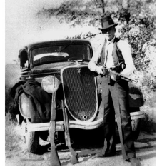 Clyde Barrow with his stolen Browning Automatic Rifle