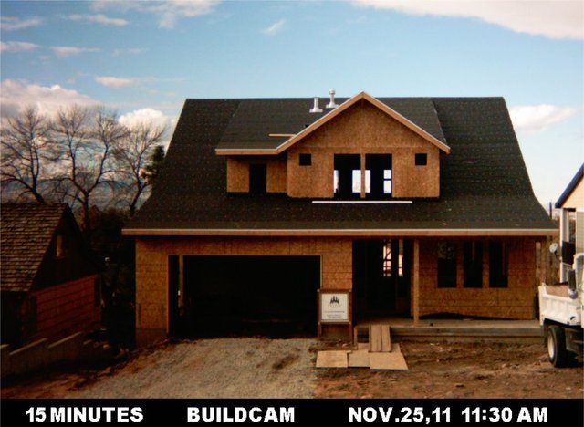 Front view with papered roof