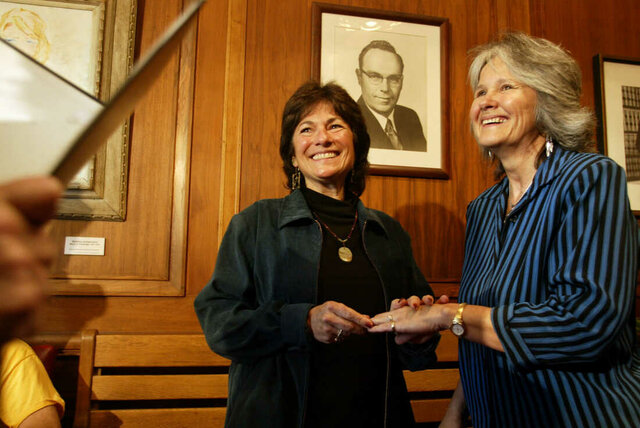 (L) Tanya McCloskey and Marcia Kadish have the first legal same-sex marriage in Massachusetts.