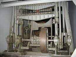 First automatic bread slicer