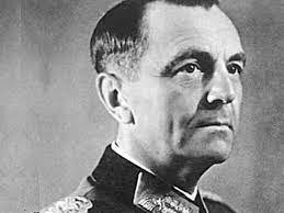 Cut off and surrounded by an entire Soviet Army Group, Friedrich Paulus, commander of the German VI Army at Stalingrad, refuses a generous Russian offer to surrender his forces. Hitler orders his general to hold position “to the last man standing.”