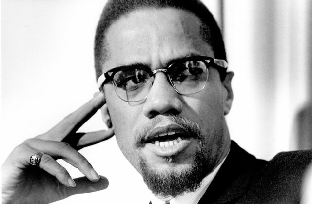 Malcolm X converts to Nation of Islam