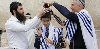 Josef's Bar Mitzvah celebrated him becoming a man (entering adulthood)