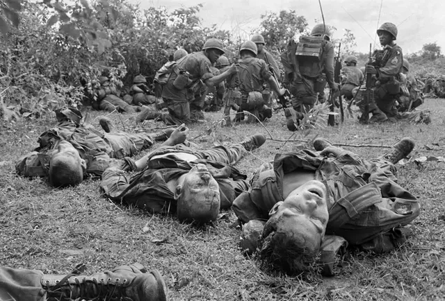 U.S. Paratroopers bodies lie near a command post during the battle of An Ninh
