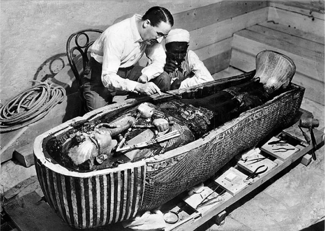 Howard Carter examines King Tut's mummy