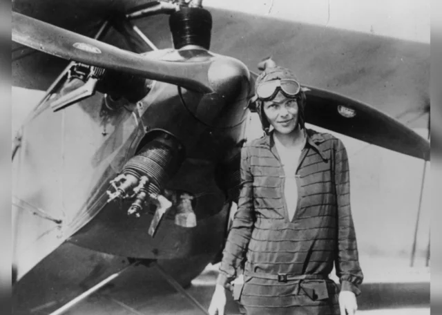 Amelia Earhart with airplane