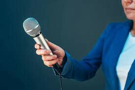 Katniss get interviewed by Caesar Flickerman