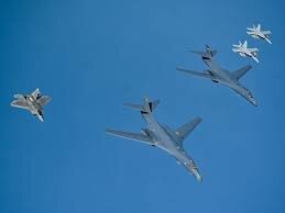 Military buildup (B-1 Bomber and MX missiles)