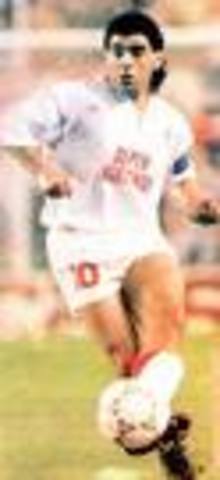 he  started playing for Sevilla