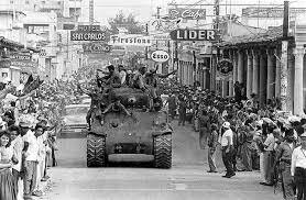 Fidel Castro and his victorious troops enter Havana