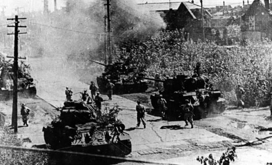 North Korean forces invade South Korea.