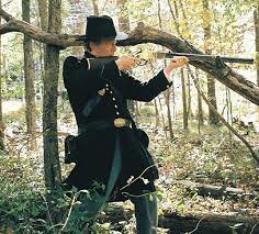 Benjamin Henry perfects the Henry Repeating Rifle