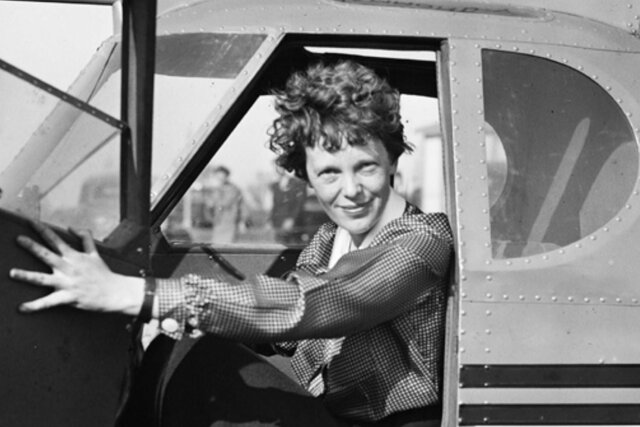 Amelia Earhart becomes the first woman to fly around the Atlantic by herself
