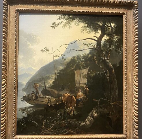 Schippers met hun boten aan de oever