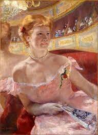 Woman with a pearl necklace in a loge