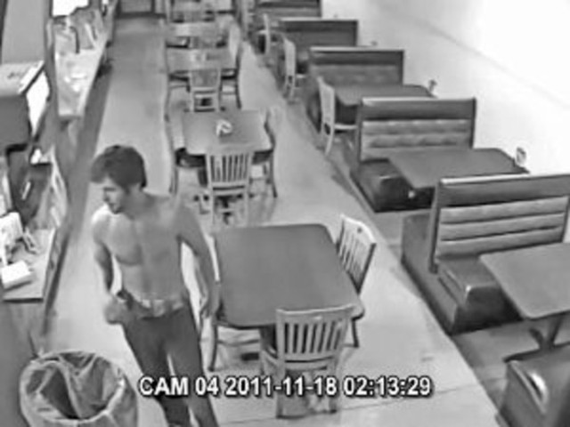 Local businesses and employers post photos and flyers in hopes of finding suspect who choked an UI police officer