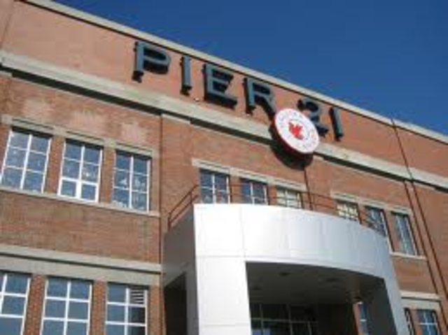 Pier 21 opens.