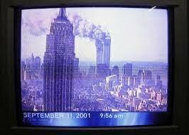 News channels show the twin towers fall on television