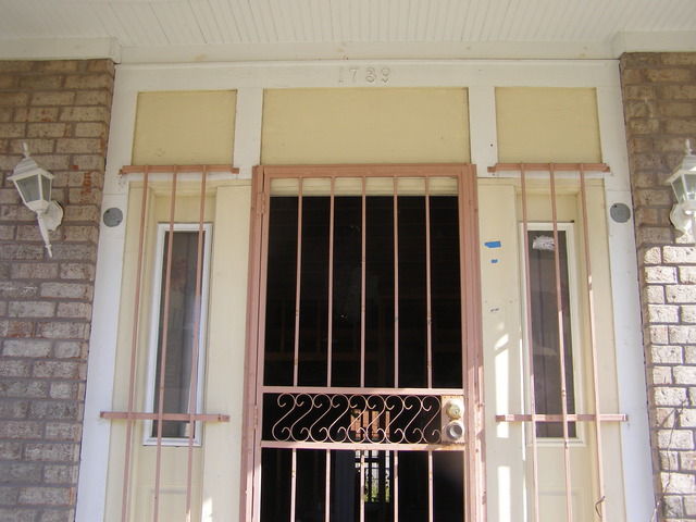 Shots of Kisa and Jewel's home, post-Katrina