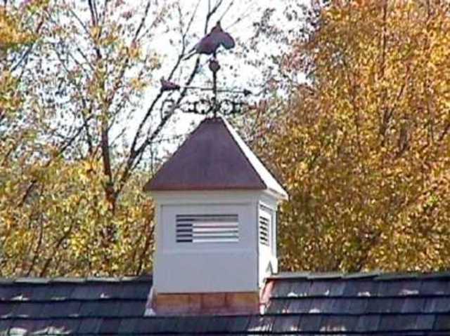 The WAEC cupala rose from the roof