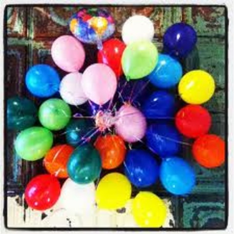 Balloons were being attached to buildings.