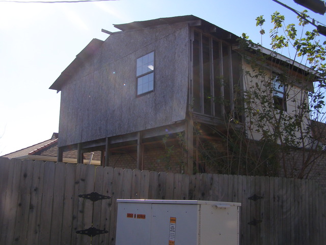 Shots of Kisa and Jewel's home, post-Katrina