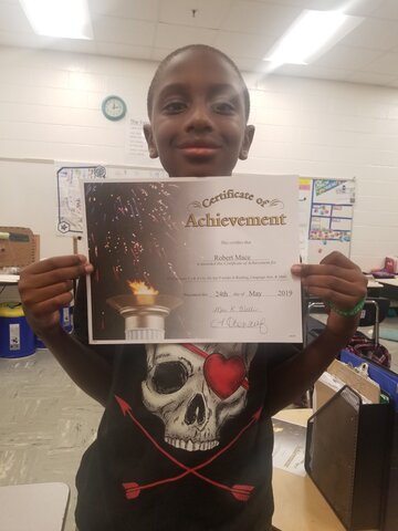 Me after graduation from 4th grade