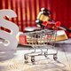 Depositphotos 105859992 stock photo little trolley pushcart with the