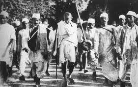 Gandhi organizes the first civil disobedience campaign.