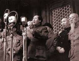 The People's Republic of China is proclaimed, with Mao (president).