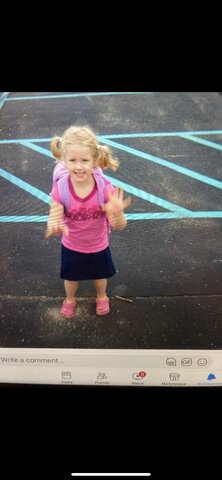 Emily learns to ride a bike.
