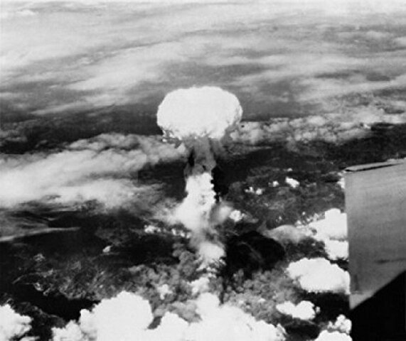 Hiroshima and Nagasaki atomic bombs explode.