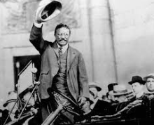 Wins first full term as President