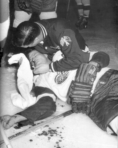 Gordie Howe crashed into the boards