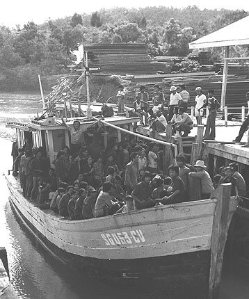 Dans le bateau pour fuir la guerre