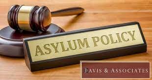 August, Political asylum granted