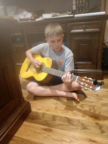 Empecé tocar la guitarra