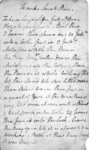 George Washington enters a beer recipe in his notebook.
