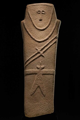 Anthropomorphic stele