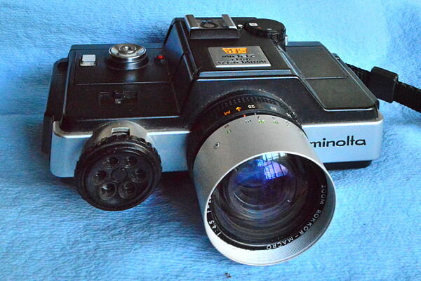 câmara Minolta 110 Zoom SLR