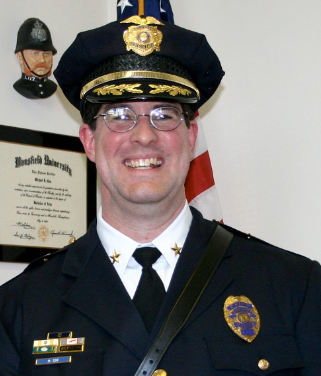 Michael Cox is chief