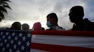 Estadunidenses y migrantes