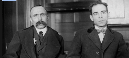Sacco and Vanzetti arrested for armed robbery and murder
