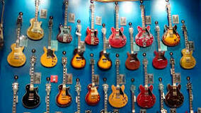 la creacio de la gitara electrica