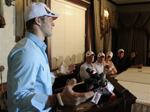 Tim talking to press about being drafted to the Denver Broncos