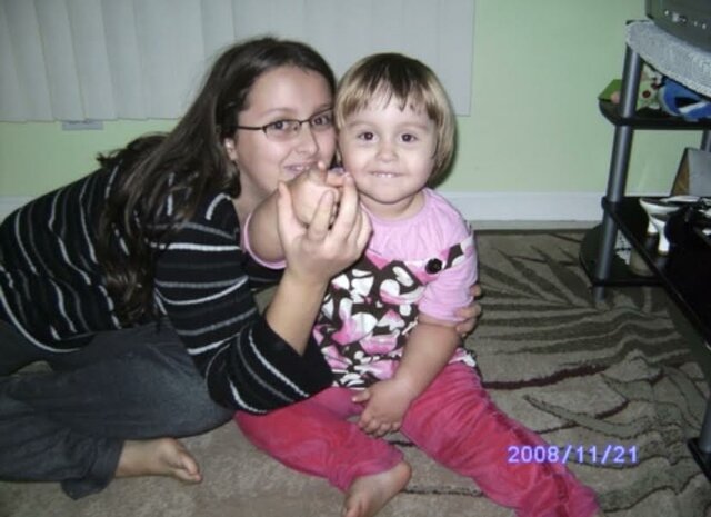 Me and my older sister Lejla pointing at the camera :)