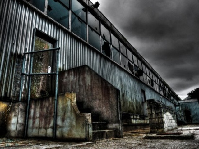 A Man and a Boy Walk Through Burned America