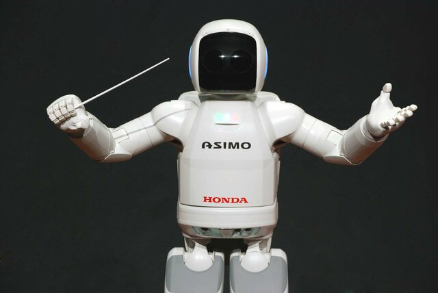 développement du premier robot à marche bipède de Honda,